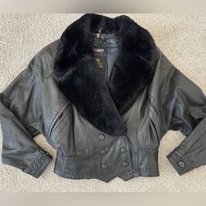 Elegant Black Leather Jacket with Plush Faux Fur Collar